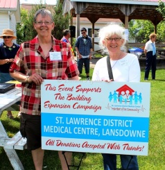 Event organizers Heather Cross, president of the SLDMC, and Gail Holtved, coordinator of the building expansion campaign
