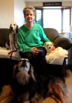 Catherine Pokrywa of Inverary stops for a moment with three of the dogs